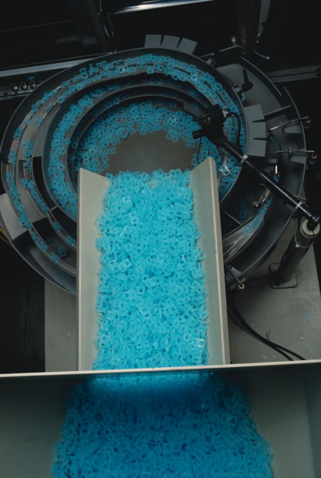 Plastic Tabs in a Piece of Machinery