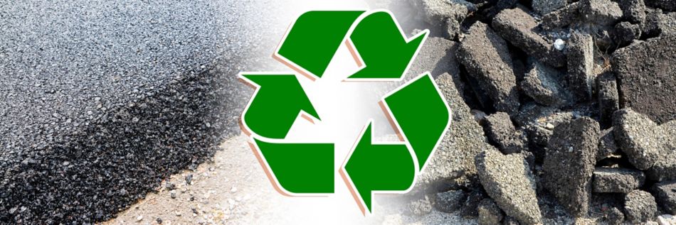 Asphalt pieces after road surface demolition with recycling symbol