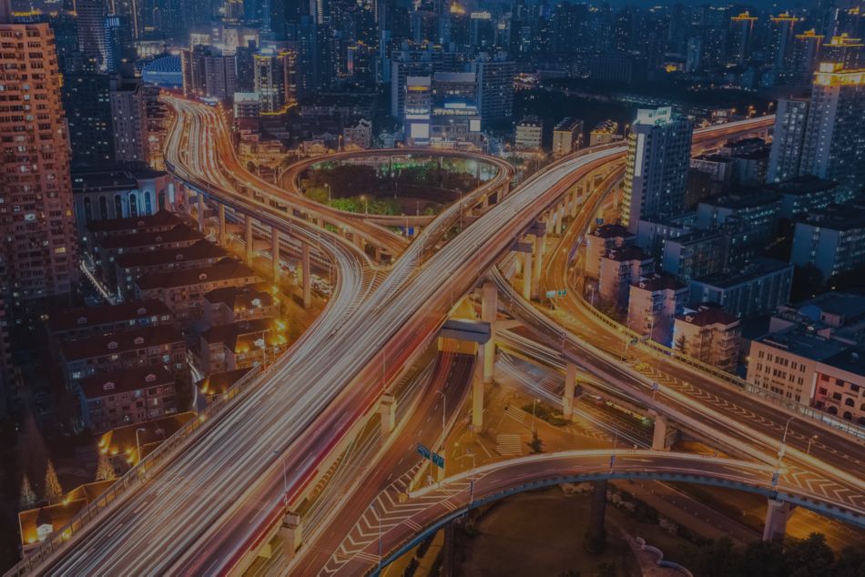 Cars on Highways in City at Night