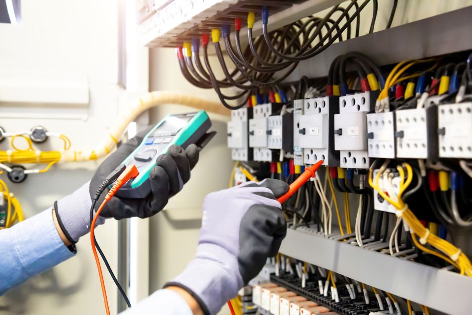Engineer Checking Circuit Breaker and Wires