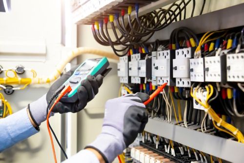 Engineer Checking Circuit Breaker and Wires