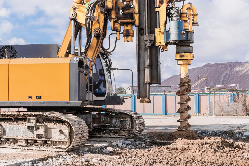 Powerful hydraulic drilling rig on a construction site. Foundation drilling.