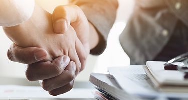 Two people shaking hands