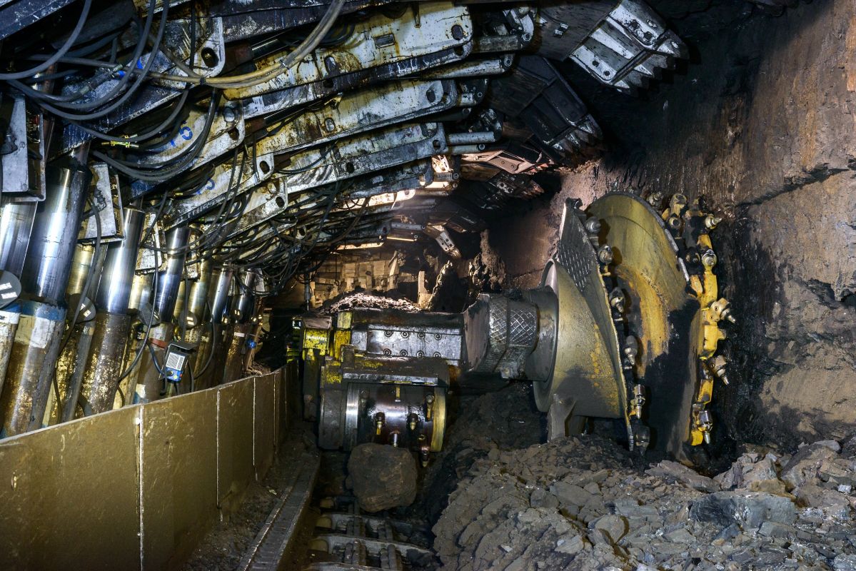 Longwall Mining: Shearer, with two rotating cutting drums and movable hydraulic powered roof supports called shields