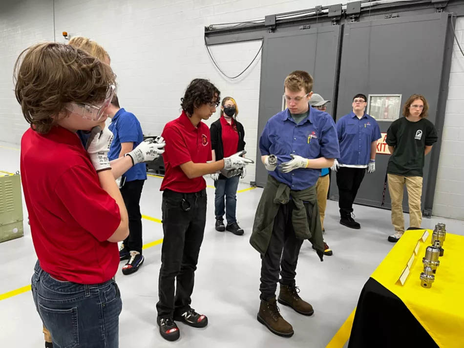 Group of students learning at Kennametal MFG Day