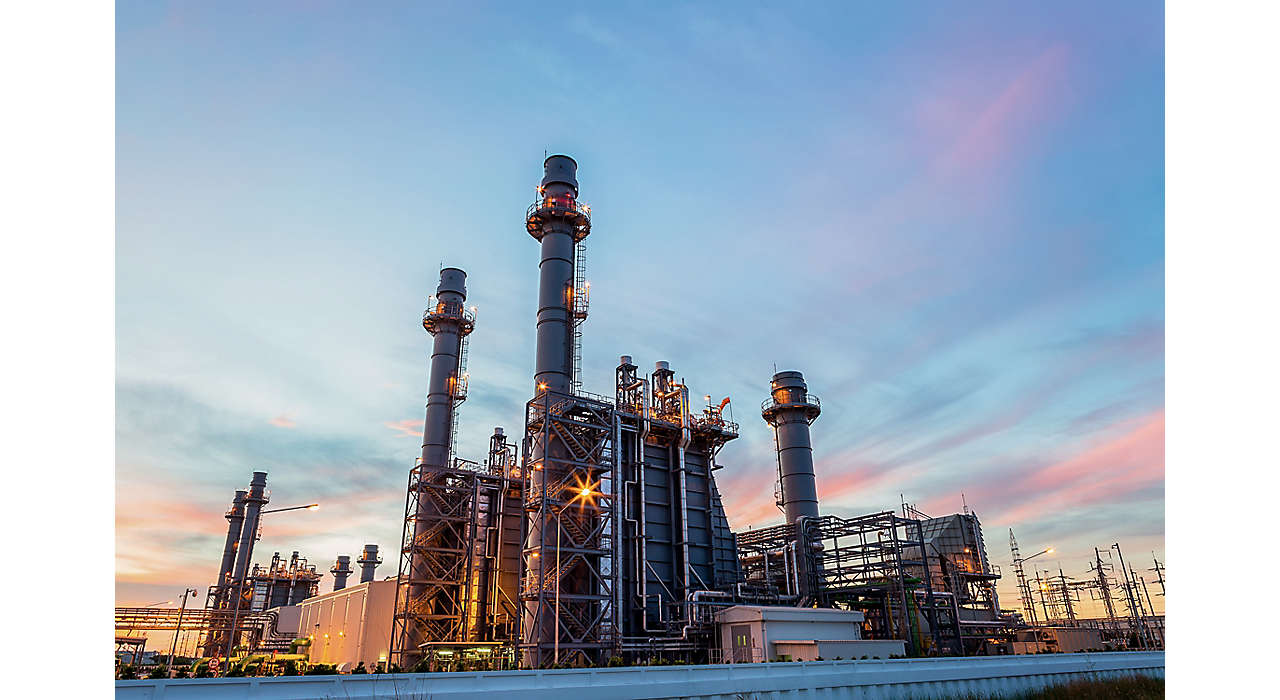 Oil petrochemical refinery plant with sunset