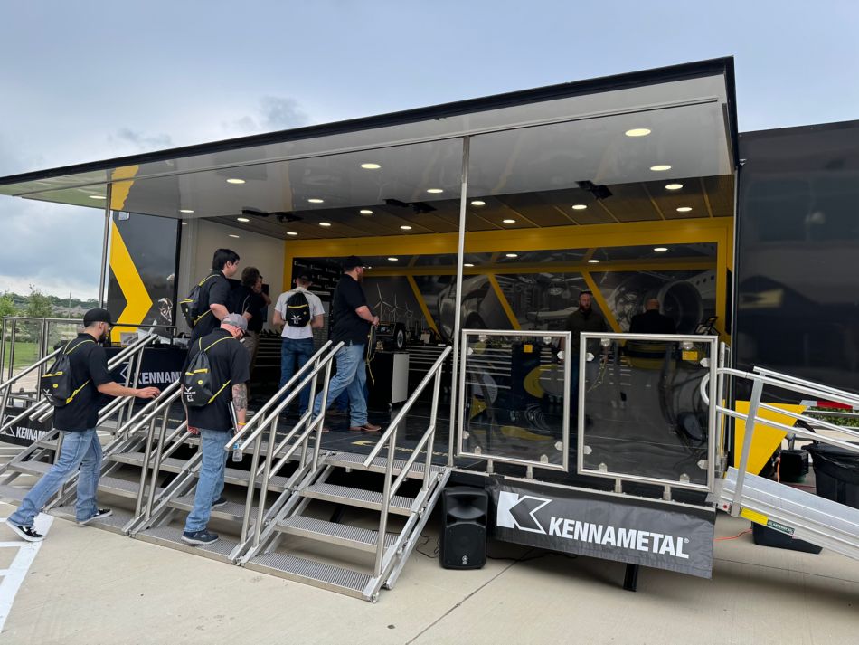 People exploring Kennametal's Metal Cutting Tour Truck at the Titans of CNC Event in 2024