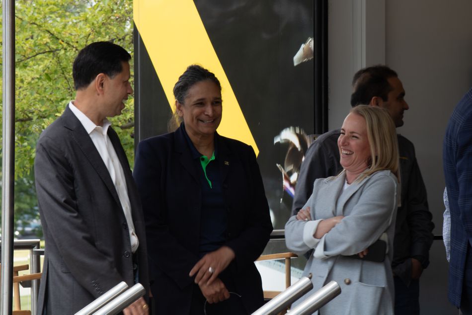 Sanjay Chowbey, Carlonda Reilly, and Ashley Koerbel share a laugh at Innovations Day 2024
