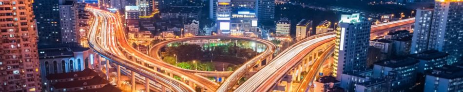 Cars on Highways in City at Night Skinny Banner