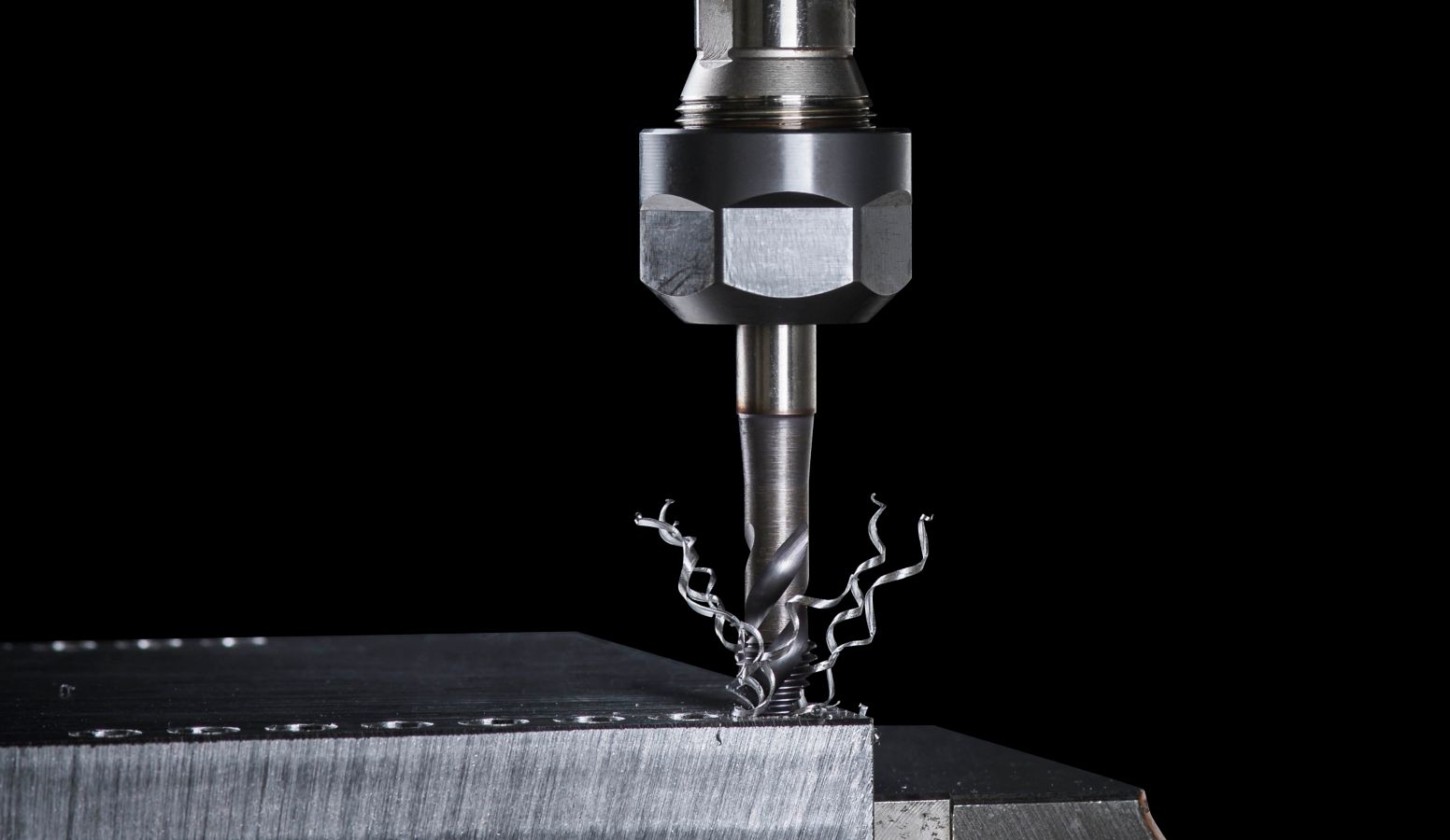 WIDIA Tap performing a CNC tapping operation